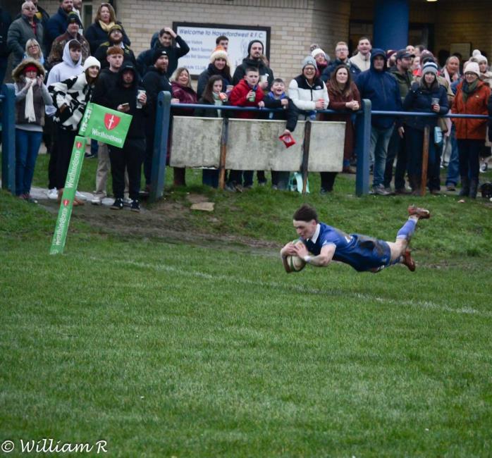 George Hopkins dives over for Haverfordwest in the clubhouse corner